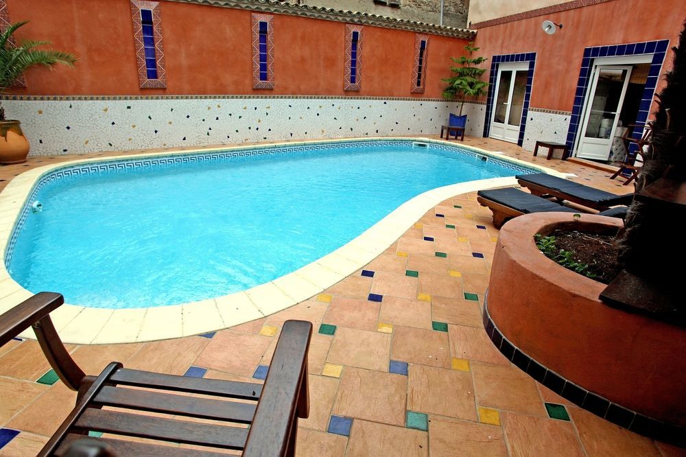 Logis Hotel Restaurant De La Paix ลูเดฟ ภายนอก รูปภาพ